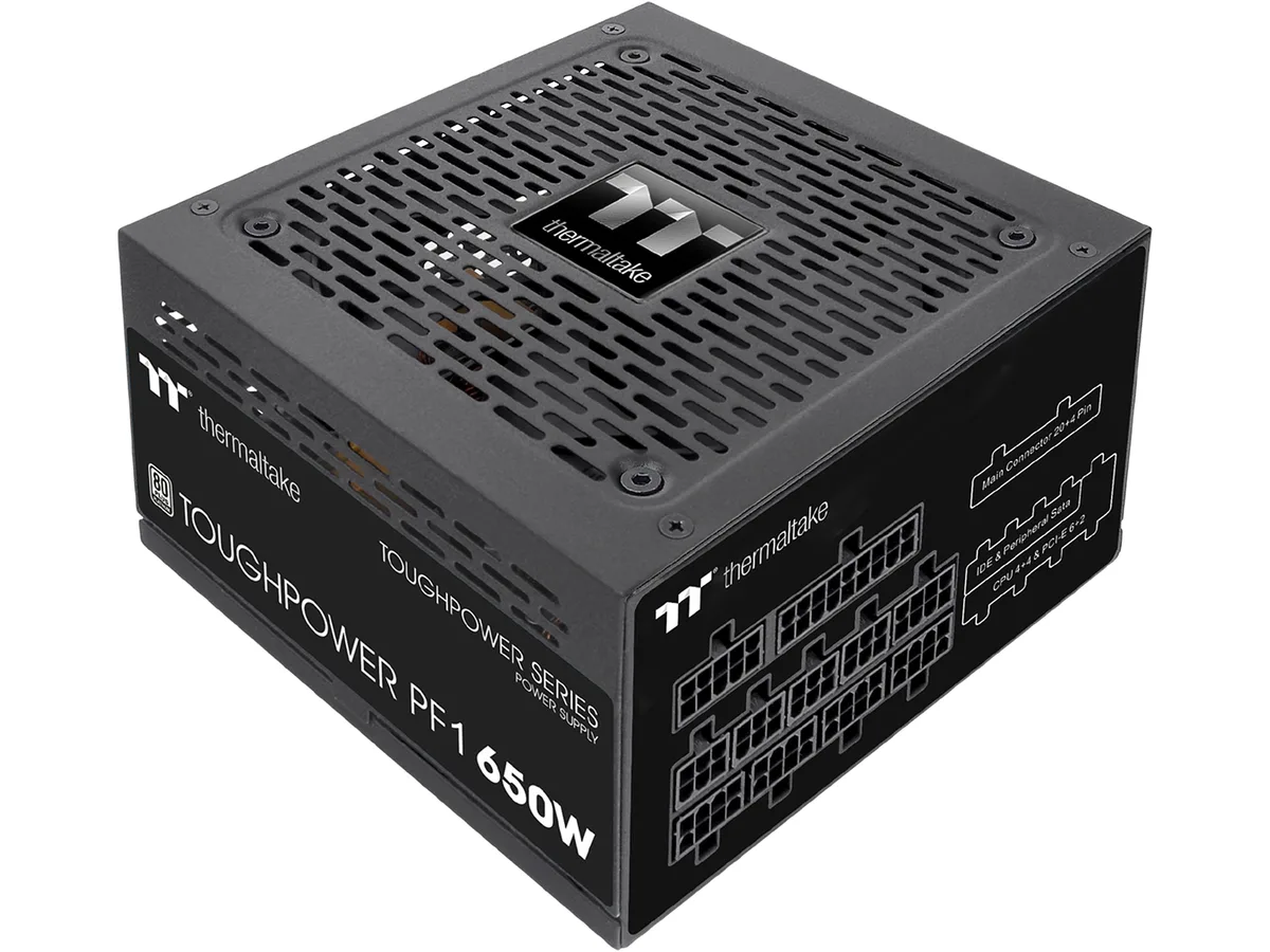 Black rectangular ATX power supply, 140mm deep, fully modular with flat cables, 120mm hydraulic fan visible