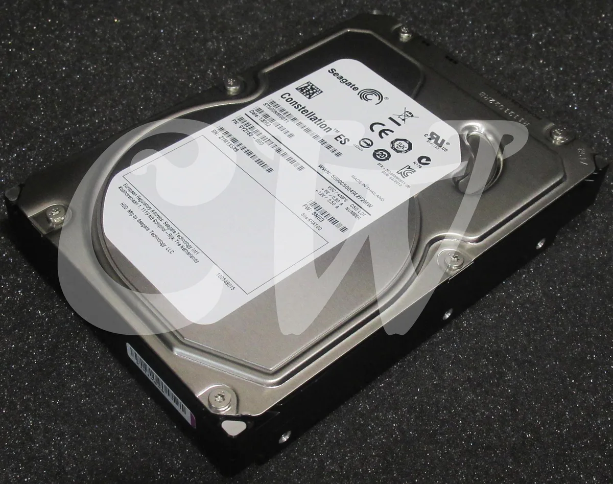 Silver 3.5 inch SATA hard drive with exposed circuit board