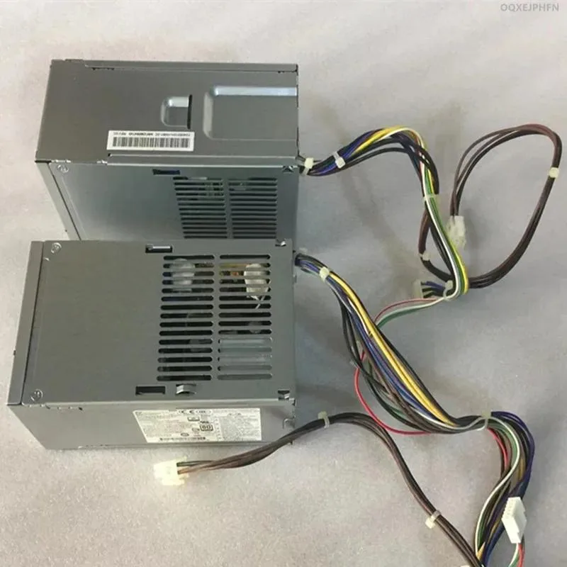 Rectangular metal ATX power supply unit with ventilation grille and fan visible