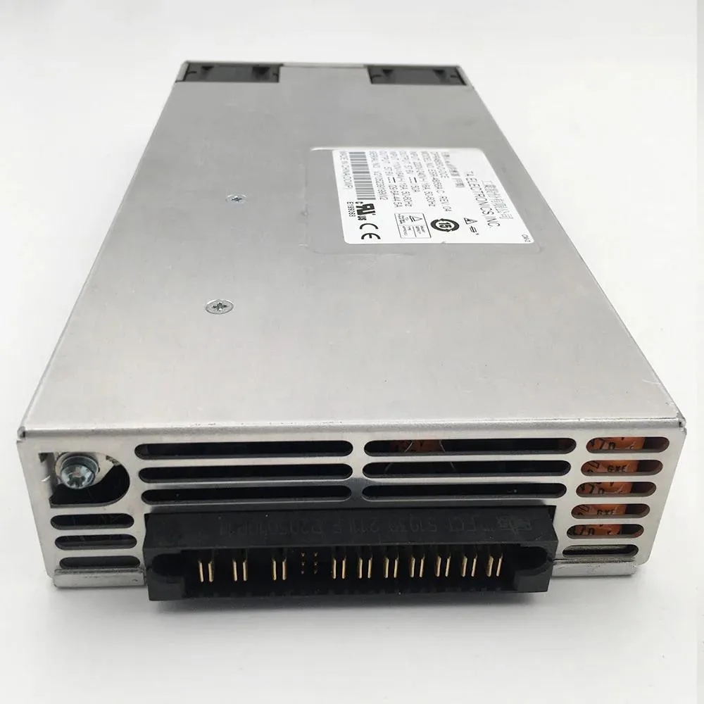 Rectangular silver ATX power module with label showing 53.5V 50A ratings
