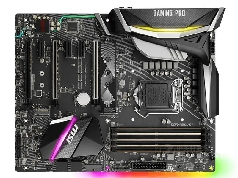 Black ATX motherboard with carbon-fibre pattern heatsinks and silver I/O shield