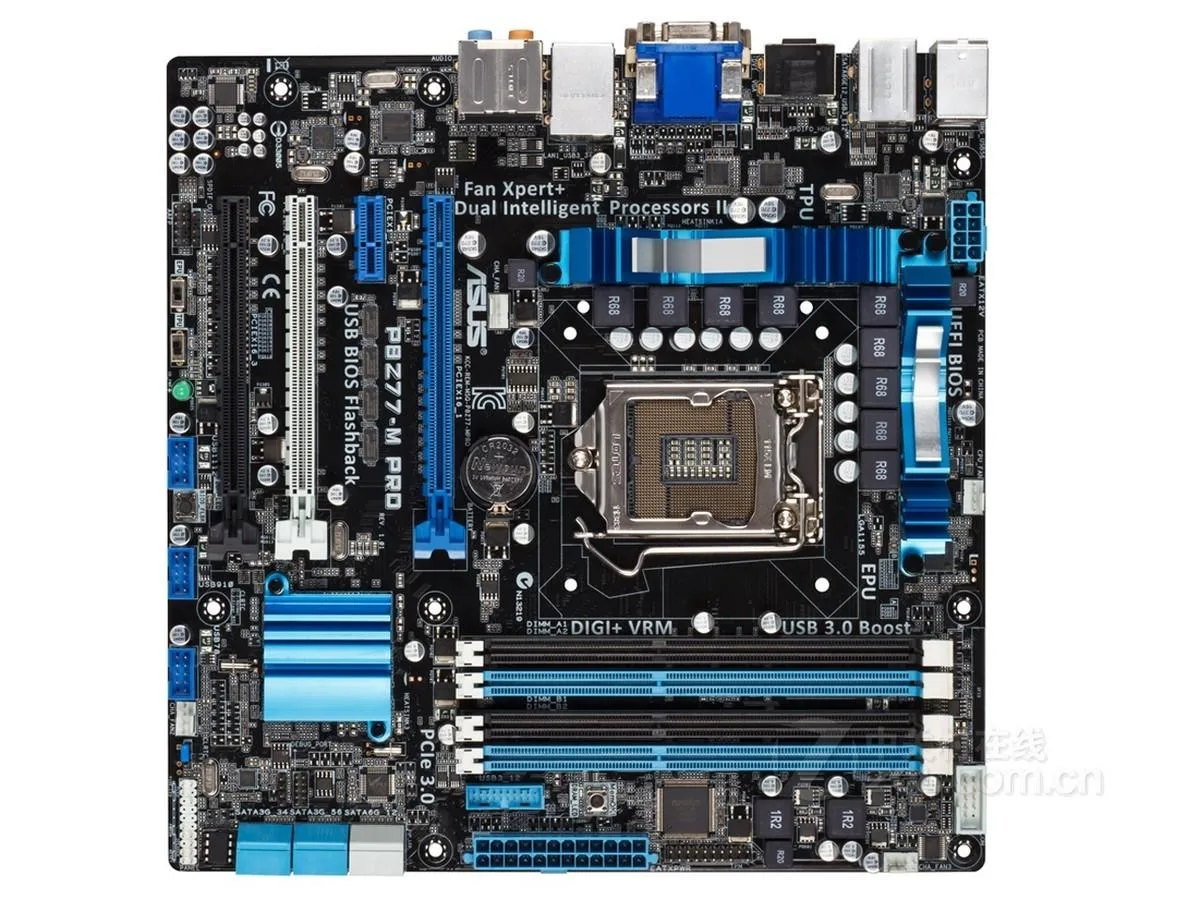 Green Micro ATX motherboard with silver heatsinks and black slots