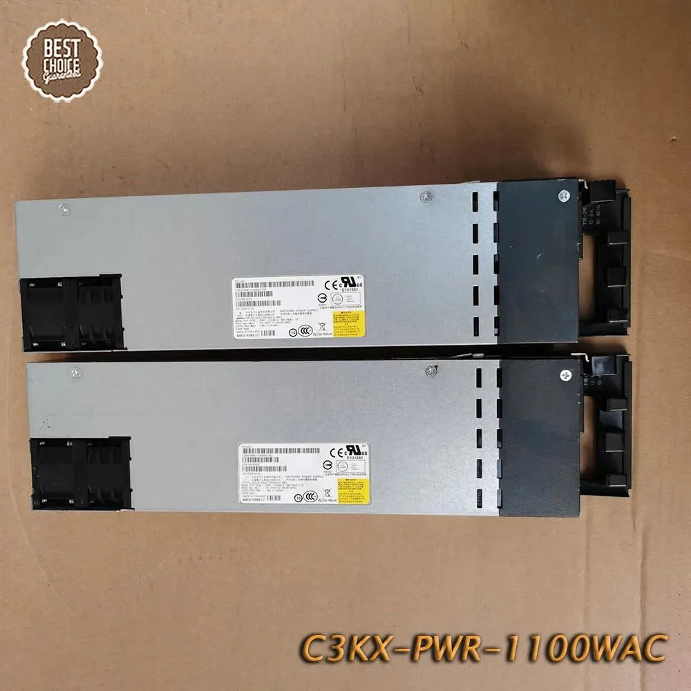 Silver rectangular ATX power supply unit with ventilation grille and label showing model numbers