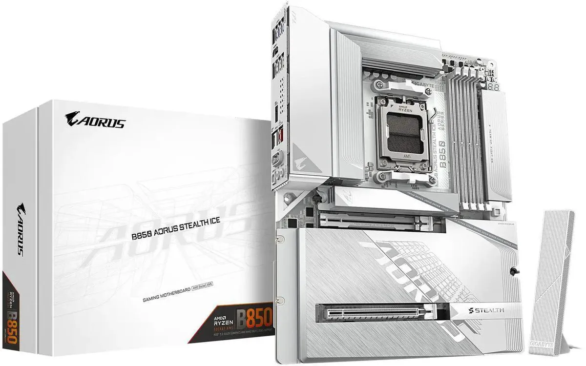 White ATX motherboard with silver heatsinks and rear I/O shield