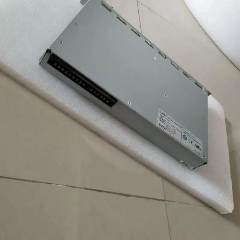 Rectangular black ATX power supply unit with ventilation grille and fan visible