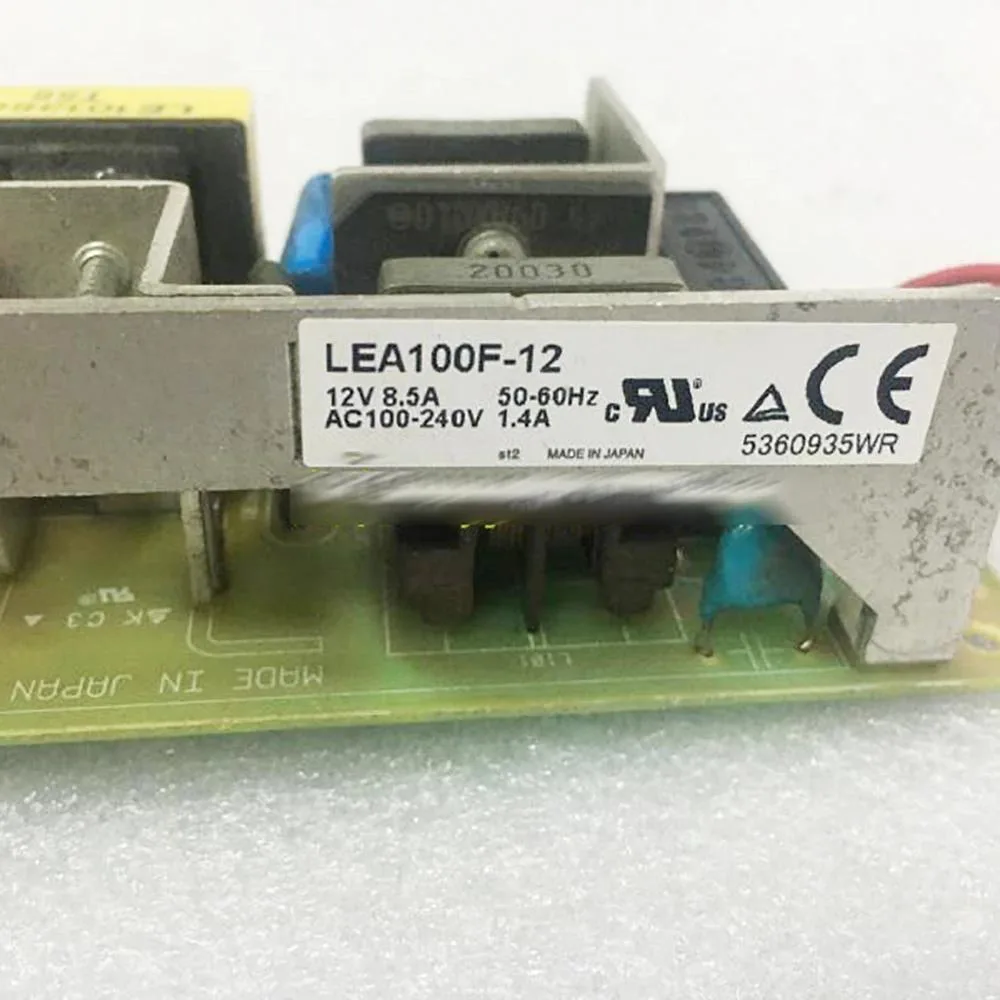 Open-frame switching power supply unit, bare PCB with components visible