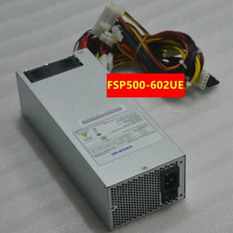 Rectangular silver metal 2U ATX power supply unit with ventilation grille and rear power socket