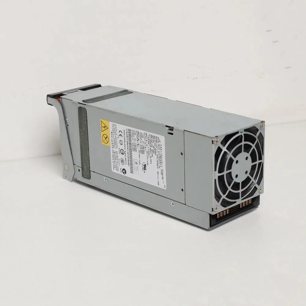 Rectangular metal ATX power supply unit with fan grille and cable bundle