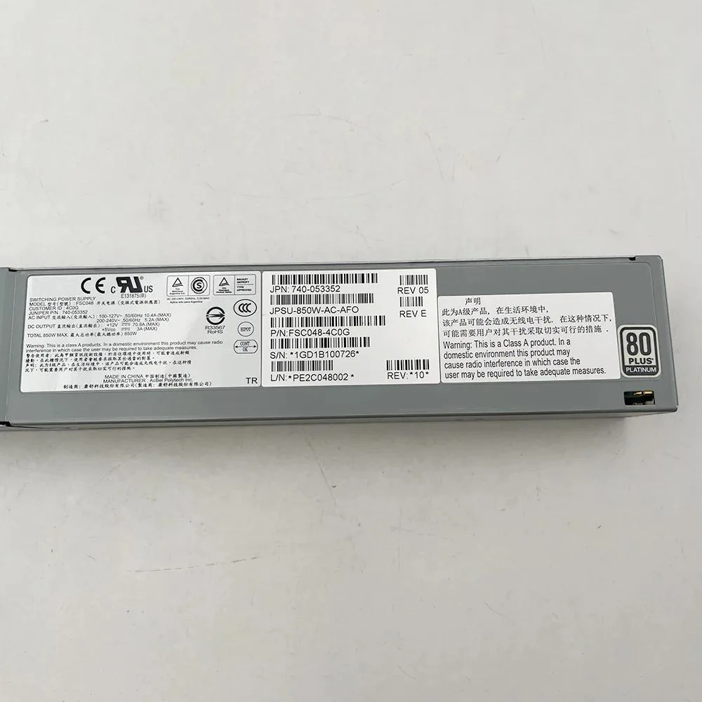 Silver rectangular ATX power supply unit with rear fan grille and power connector