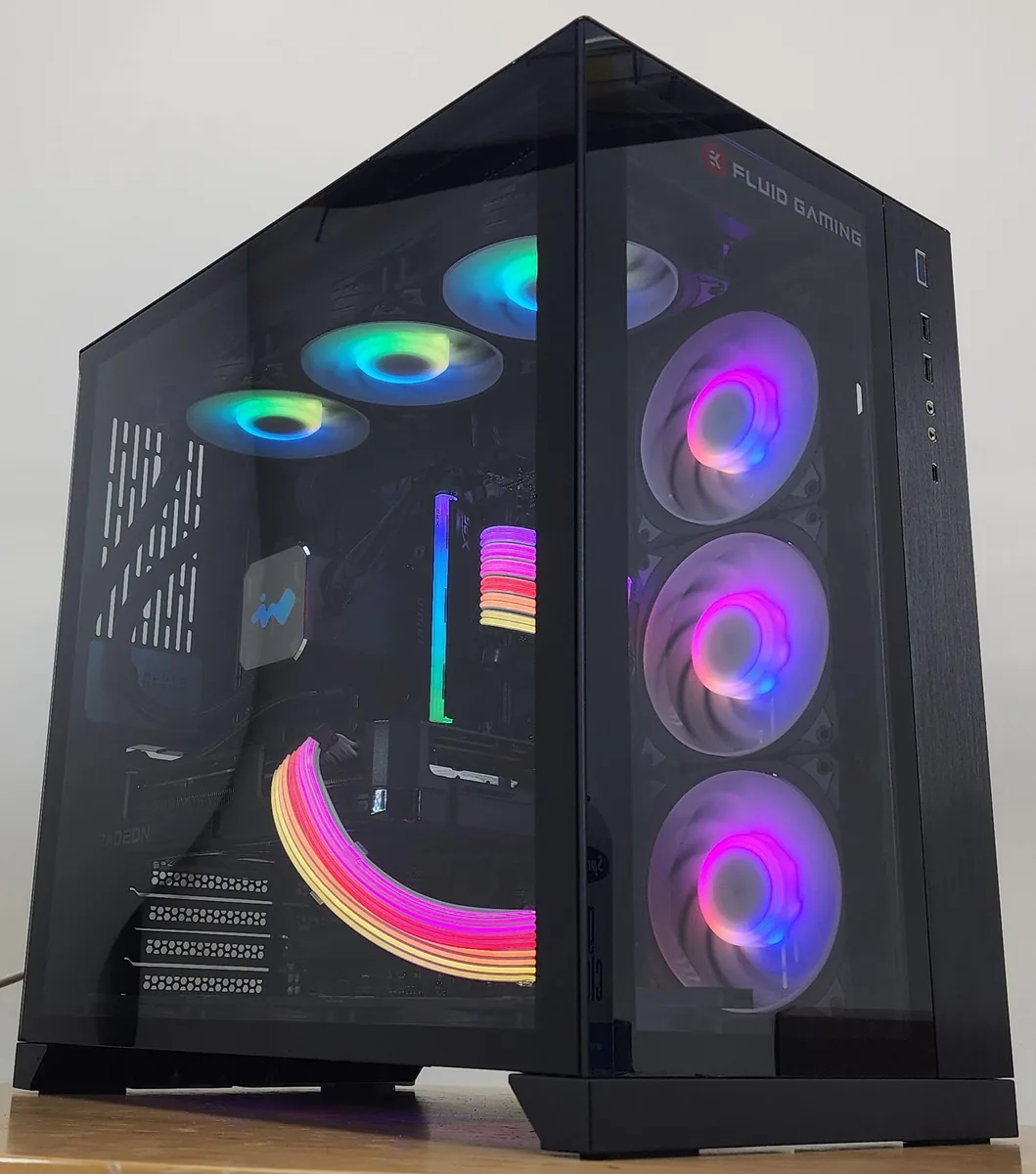 Black Lian Li O11 Dynamic ATX case with 360mm AIO RGB cooler and RX 7800 XT graphics card visible through tempered glass side panel