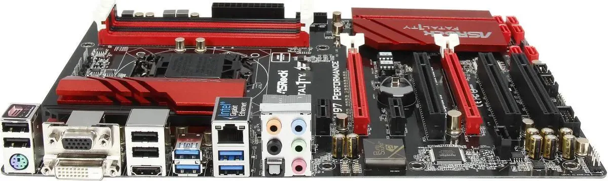 ATX motherboard, black PCB with red accents, silver heatsinks, LGA 1150 socket, four DDR3 slots