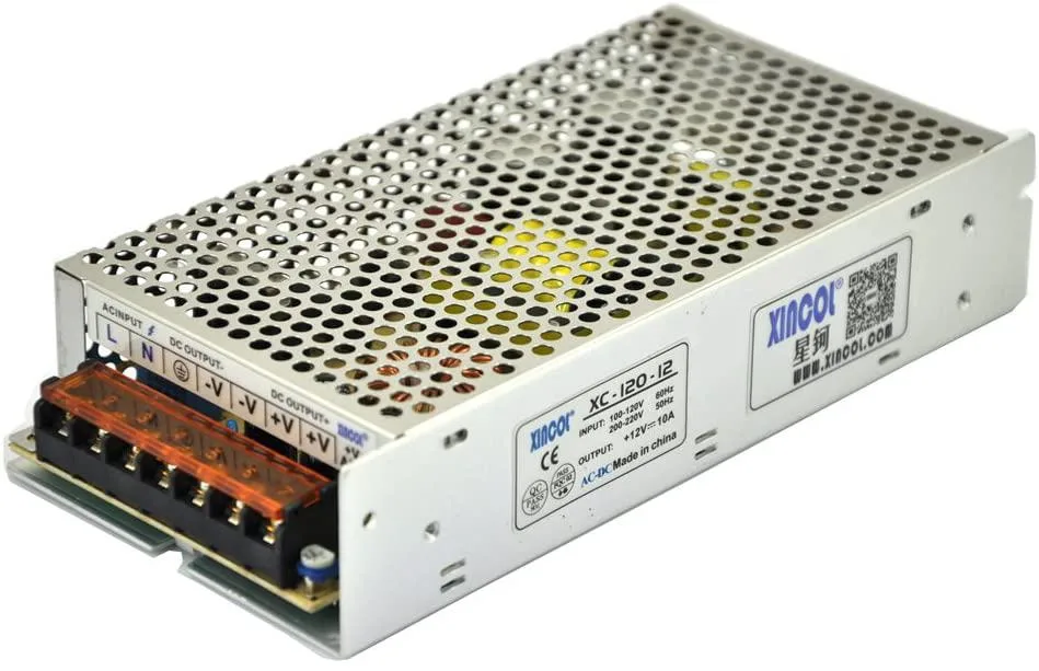 Rectangular silver aluminium unit with screw terminals and voltage selector switch