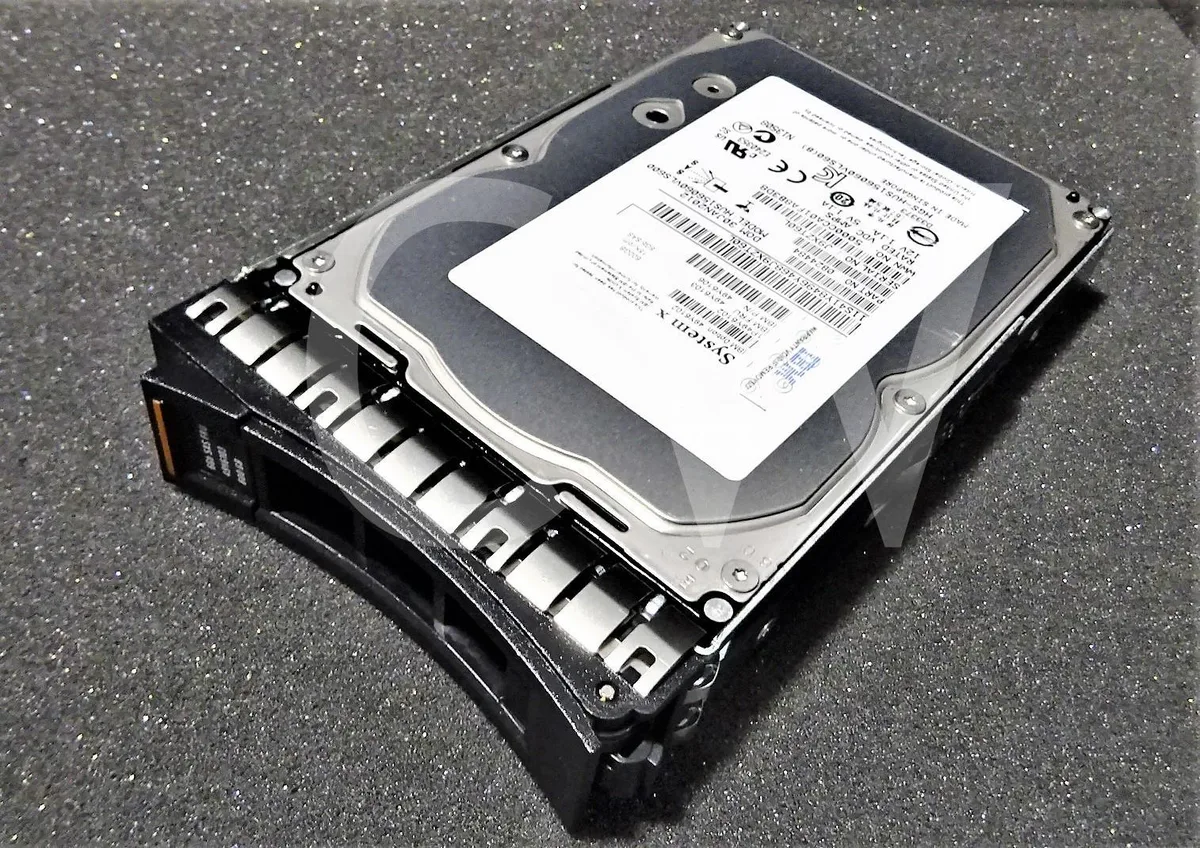 3.5 inch SAS hard drive in silver metal caddy tray