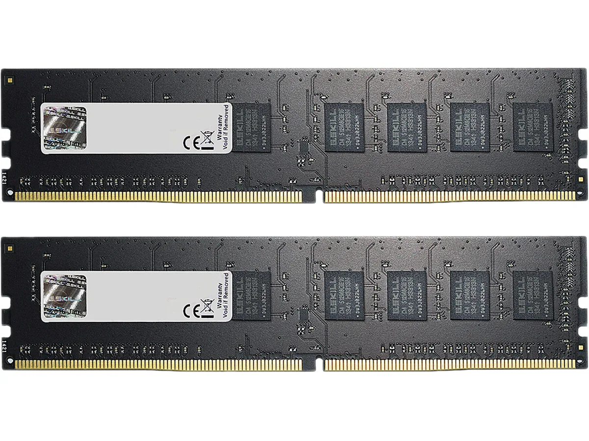 Two bare green DDR4 sticks, no heat spreader, side by side