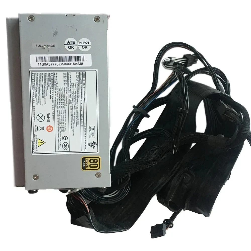 Rectangular silver ATX power supply unit with fan grille and cable bundle