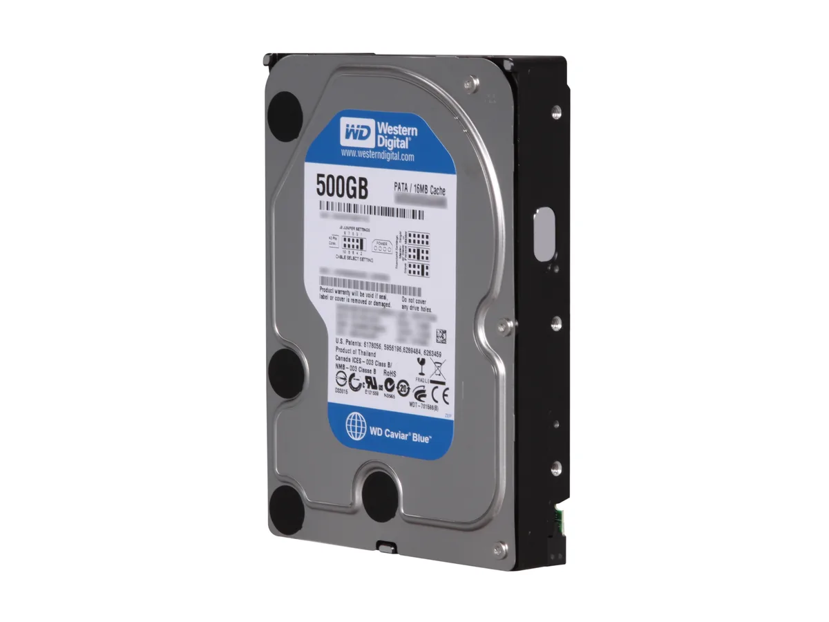 Silver 3.5 inch bare IDE hard drive with green circuit board