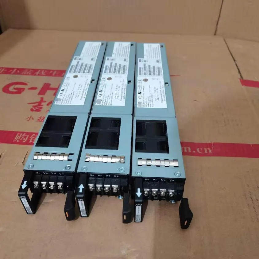 Silver rectangular power supply unit with rear fan grille and side label