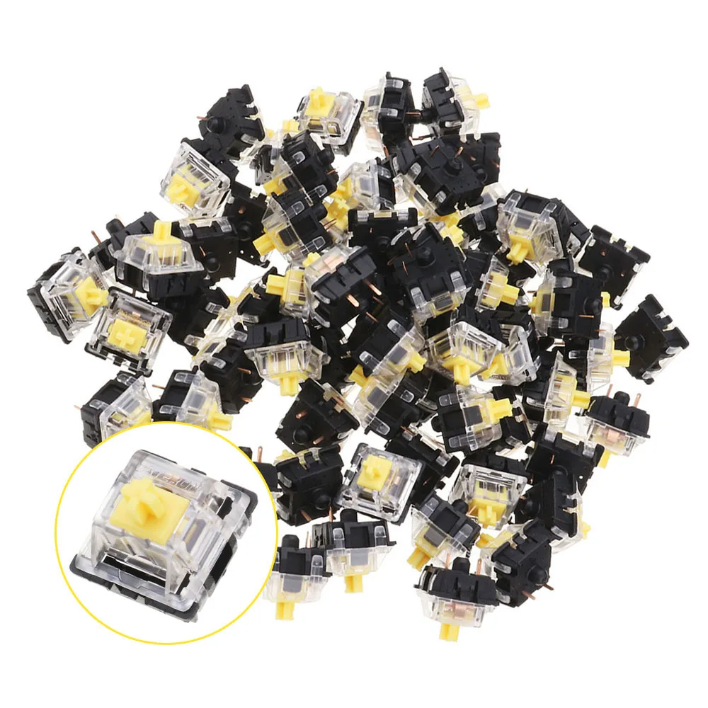 Clear plastic box holding seventy Gateron Yellow linear switches with transparent housings and yellow stems