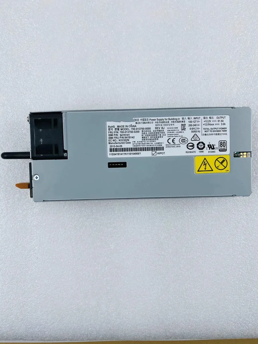 Rectangular ATX power supply unit with matte metal casing and rear fan grille