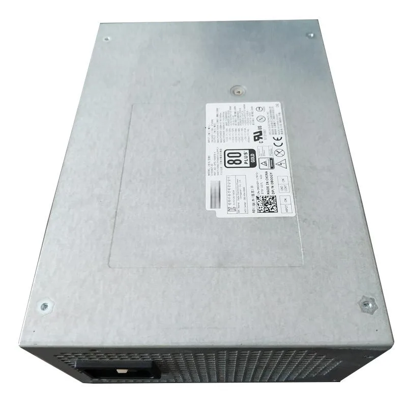 Rectangular metal ATX power supply unit with fan grille and label showing 1500W