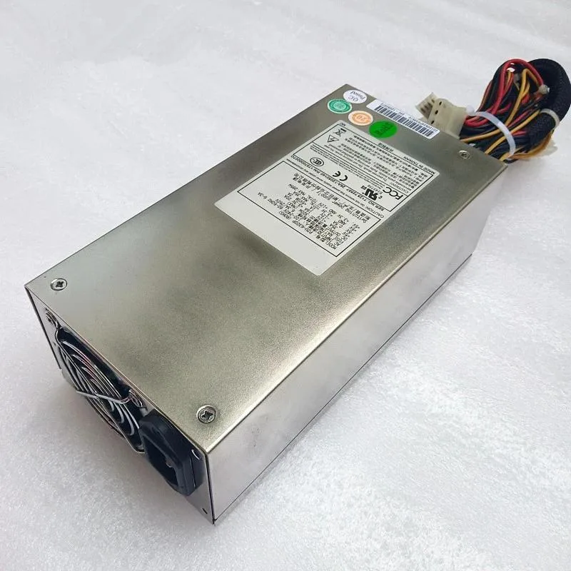 Silver rectangular 2U ATX power supply unit with rear fan grille and power socket