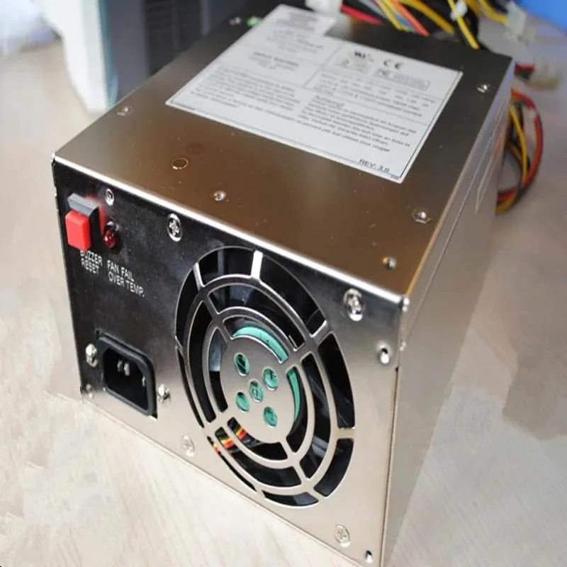 Rectangular black ATX power supply unit with fan grille visible