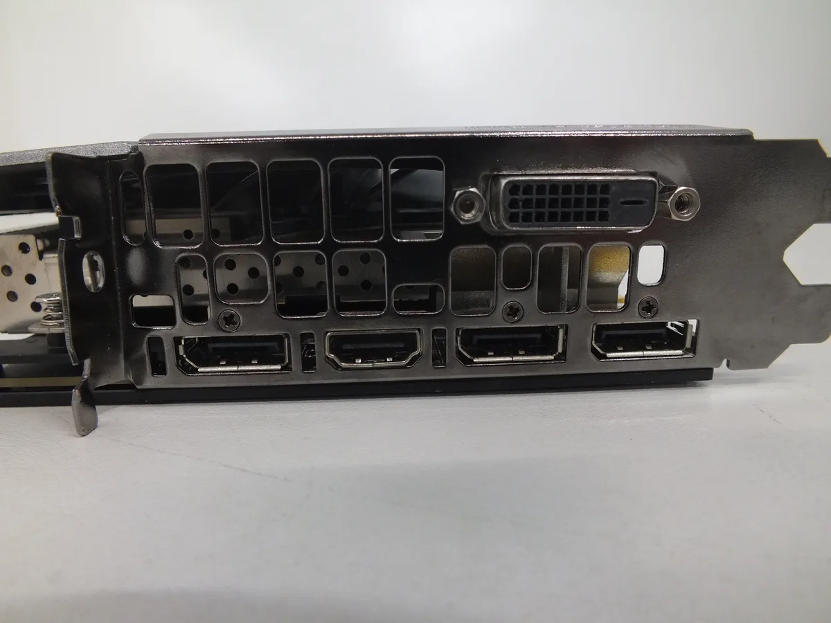 Triple-fan graphics card with silver shrool, black backplate and RGB lighting