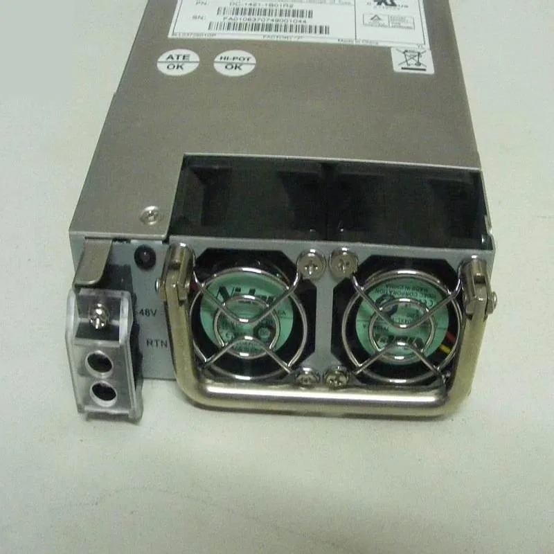 Rectangular ATX power supply unit with metal casing and cooling fan visible