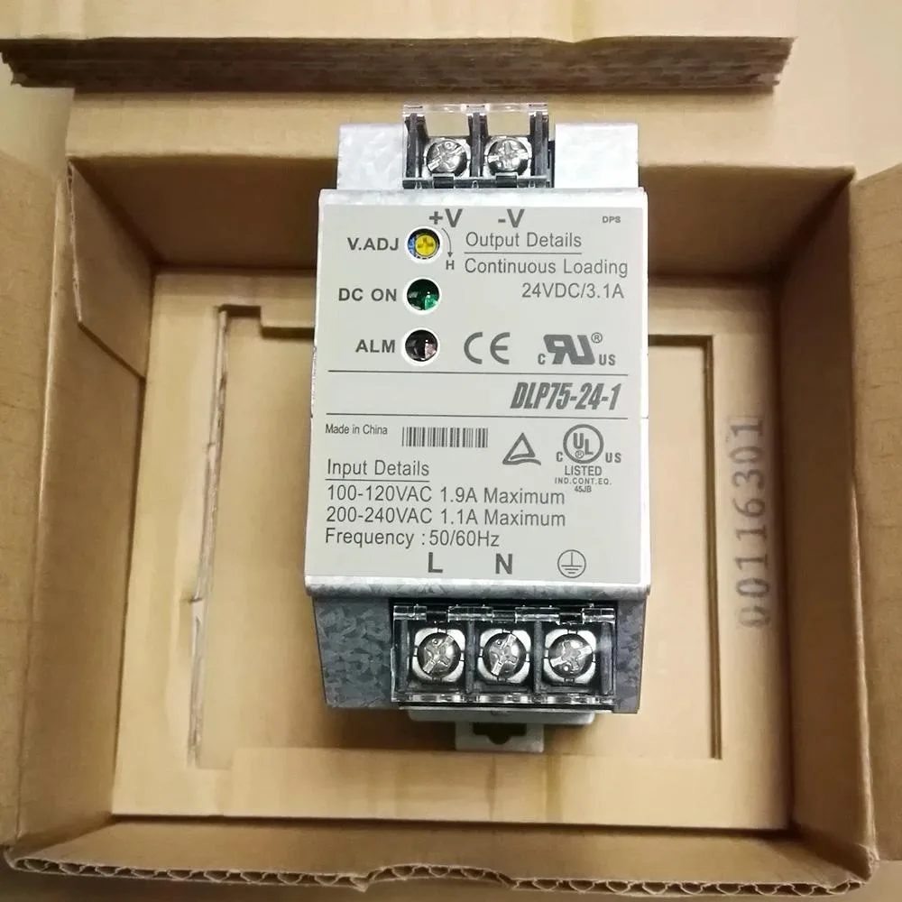 Rectangular metal power supply unit with ventilation slots and terminal connectors