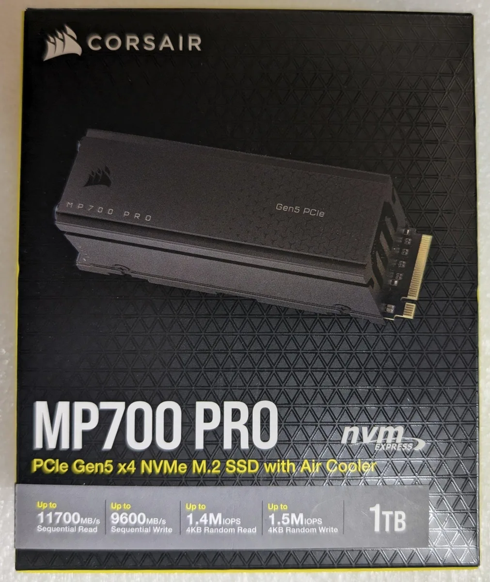 Black M.2 2280 SSD with an active air cooler attached
