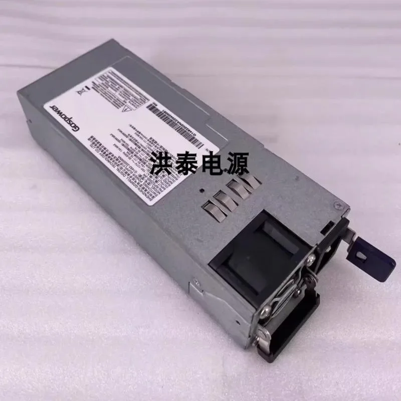 Rectangular metal ATX power supply unit with ventilated sides and rear fan grille
