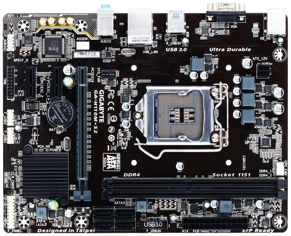 Green rectangular micro-ATX motherboard with black slots and silver heatsinks