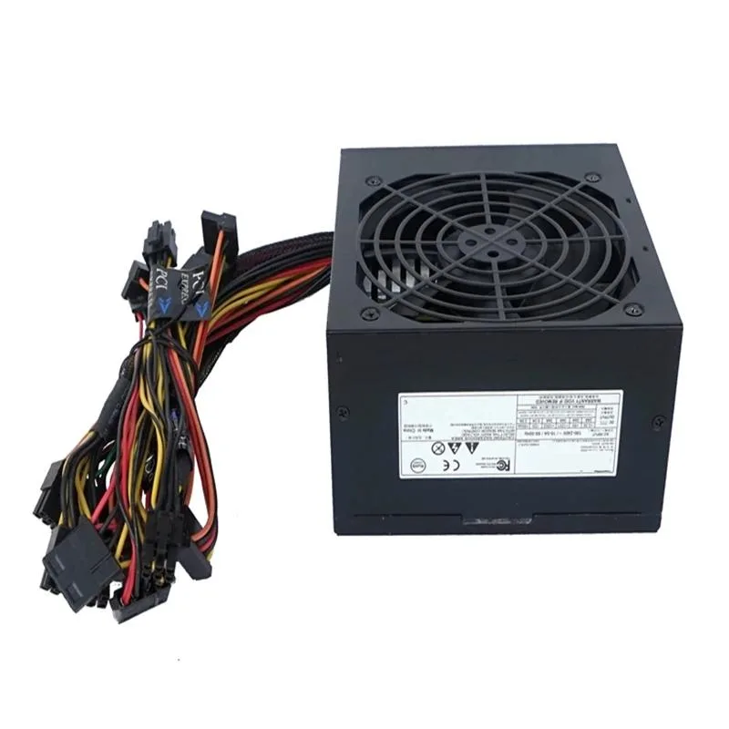 Rectangular metal PSU unit with fan grille and cable bundle
