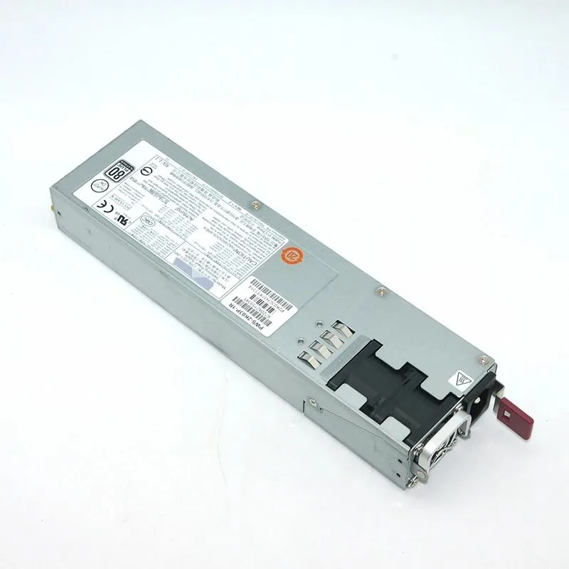 Silver rectangular ATX power supply unit with ventilation grille