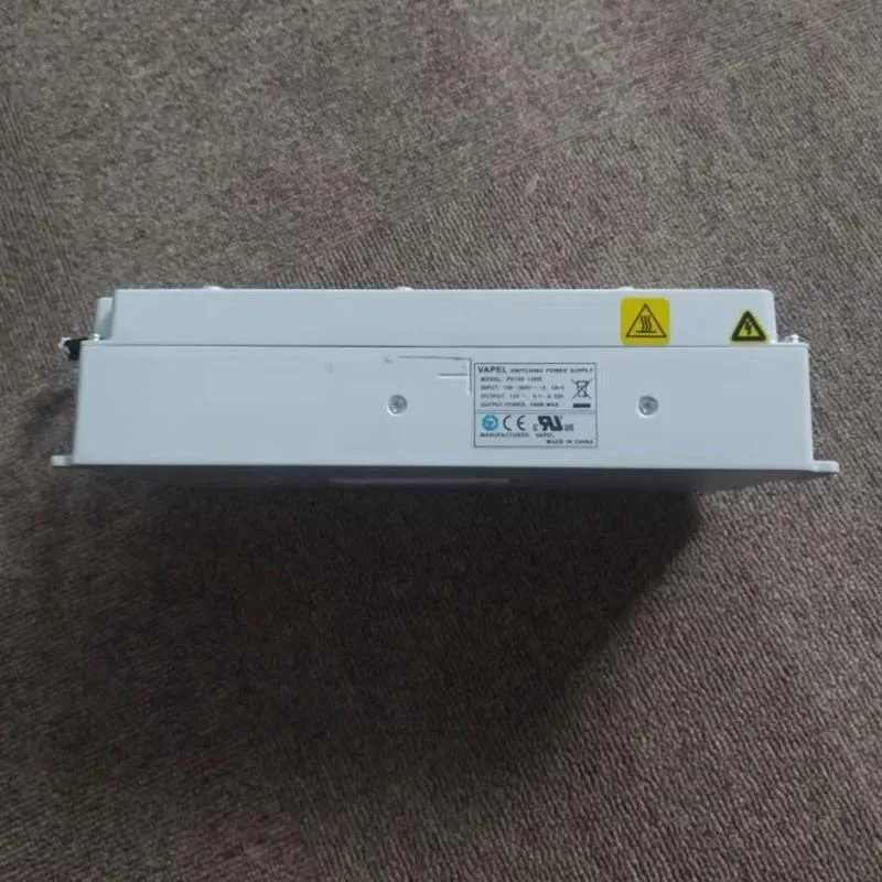 KHACHIMO 100W ATX power supply unit, metal case, fan grille visible