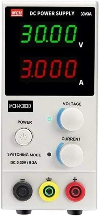 Compact beige bench power supply with digital voltage and current display, rotary knobs and binding posts