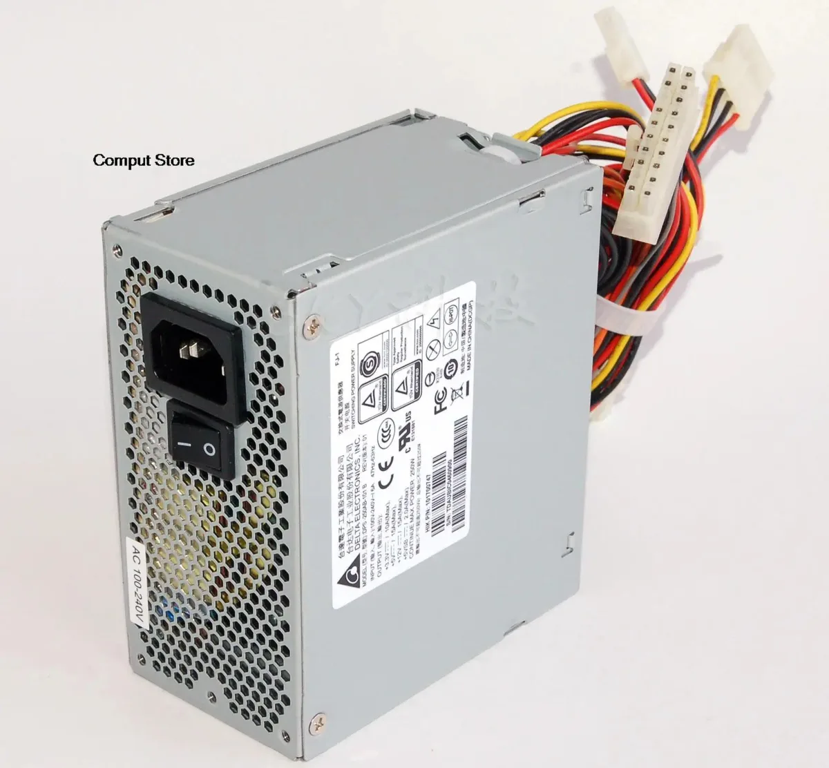 Silver ATX power supply unit with 20-pin connector and four IDE plugs