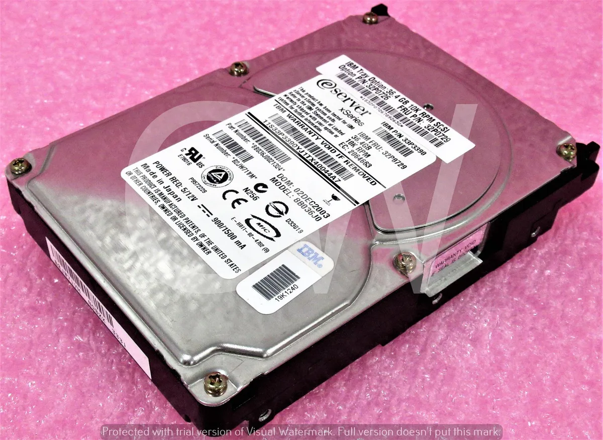 Silver 3.5 inch SCSI hard drive with circuit board visible