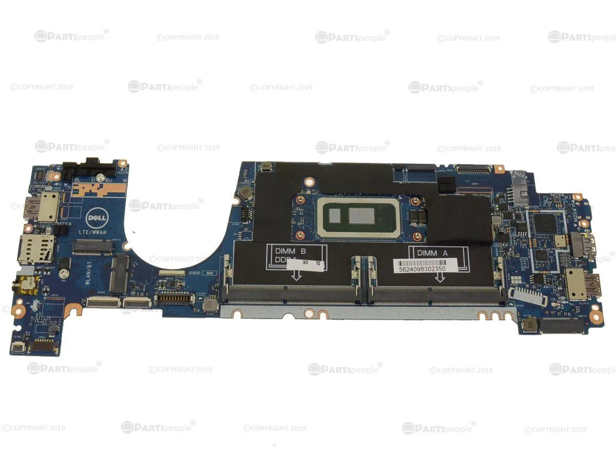 Green laptop motherboard with silver CPU and silver heatsink visible