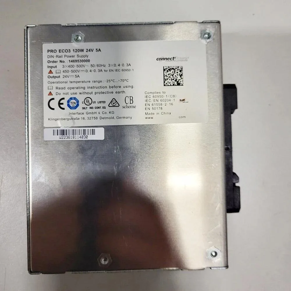 Rectangular metal power supply unit, matte grey finish, terminal block visible