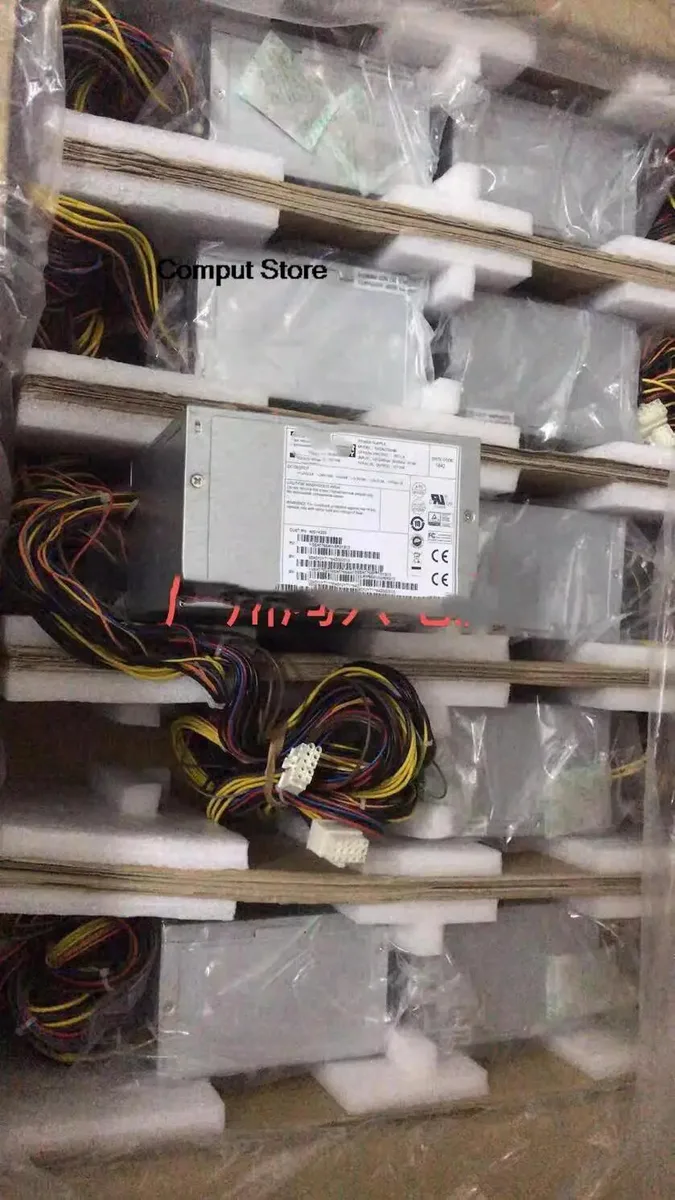 Rectangular silver ATX power supply unit with ventilation grilles and side label