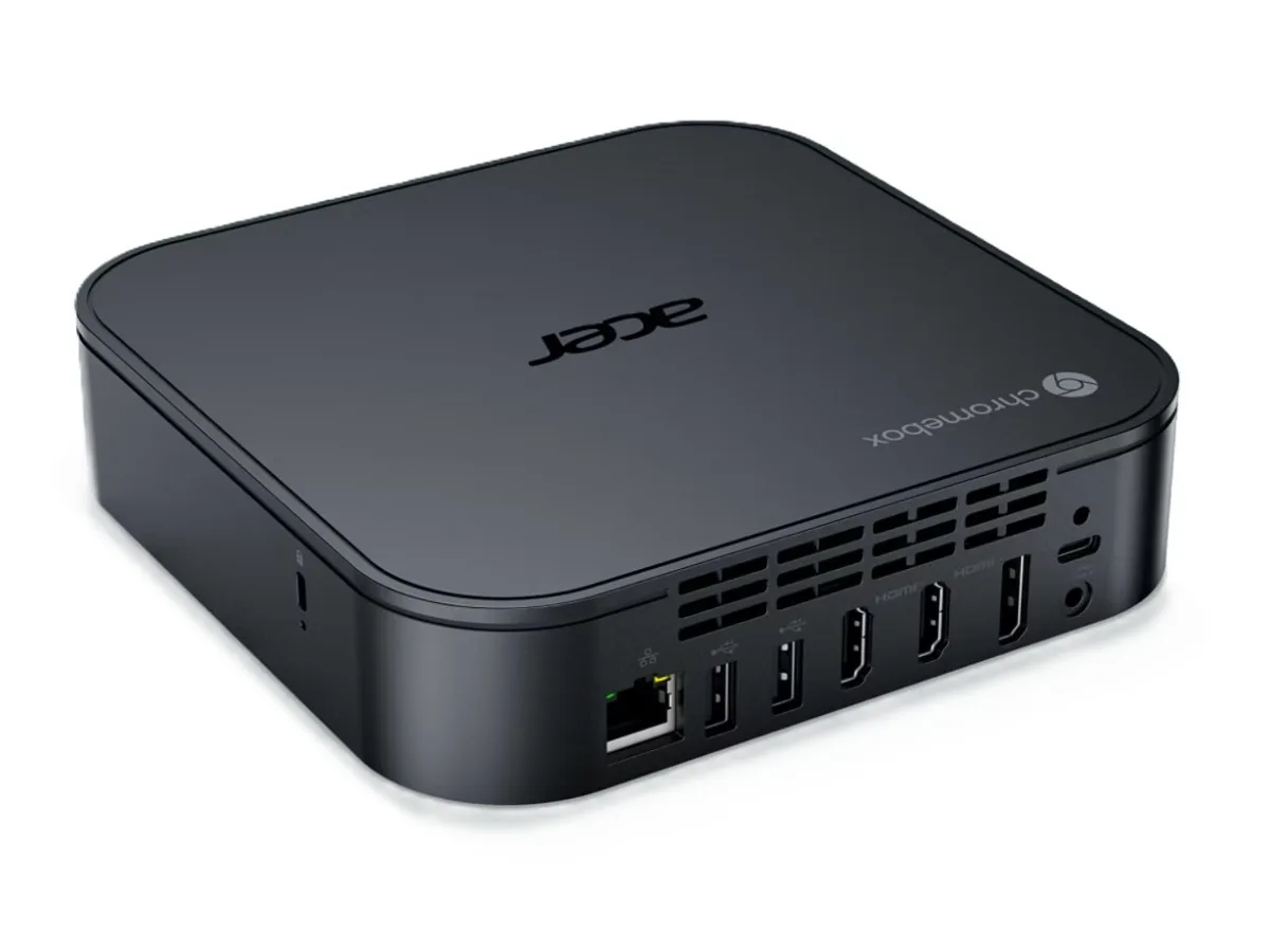 Compact black rectangular Chromebox desktop unit with matte finish