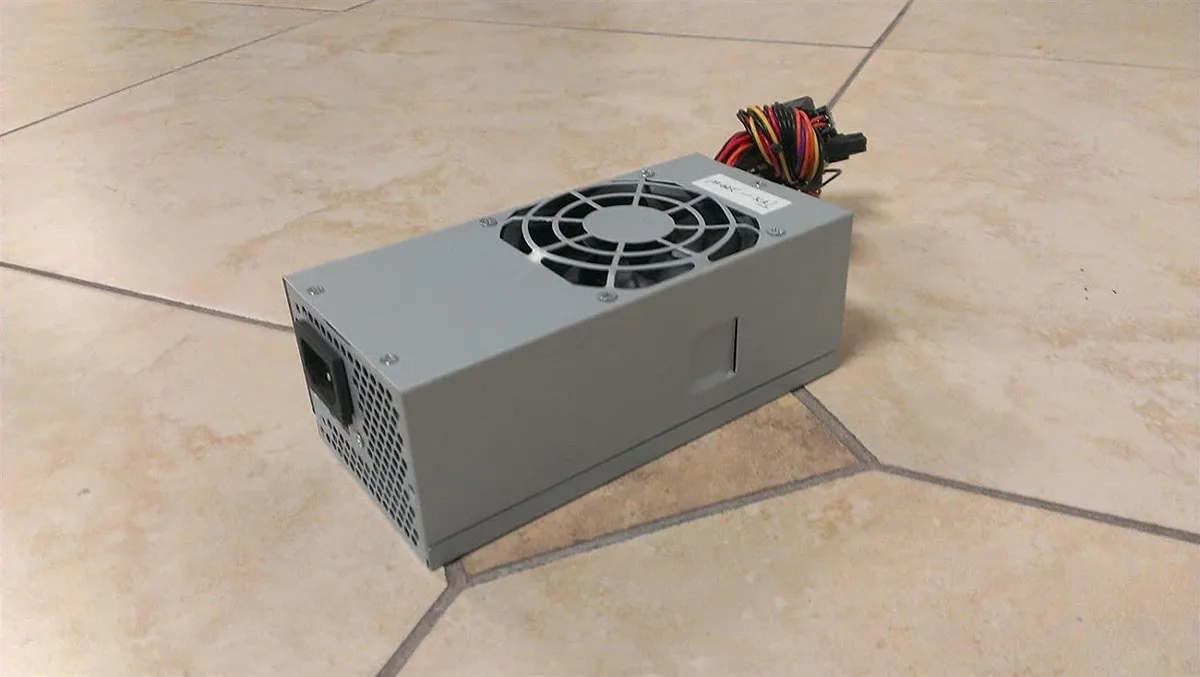myVolts 420W TFX power supply unit silver metal casing 80mm fan visible