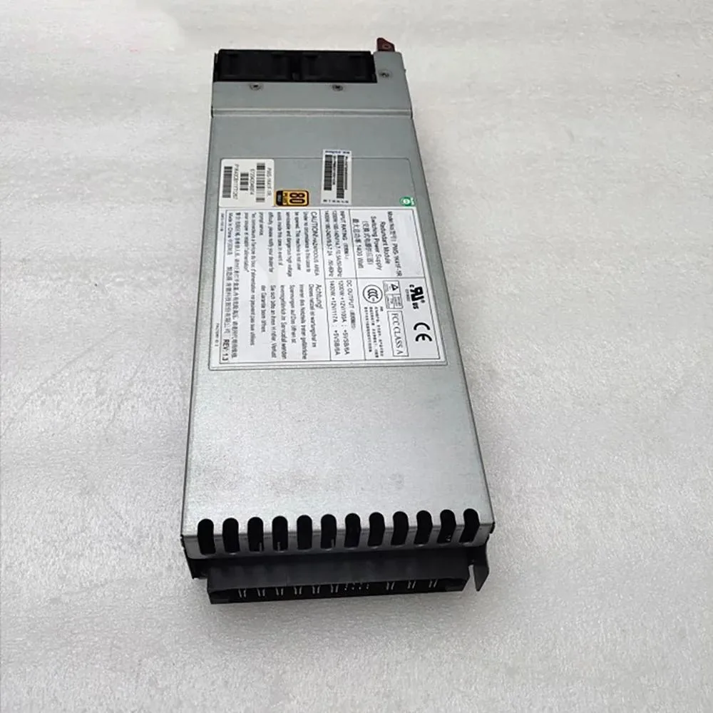 Redundant server power supply unit with silver metal casing and rear fan grille