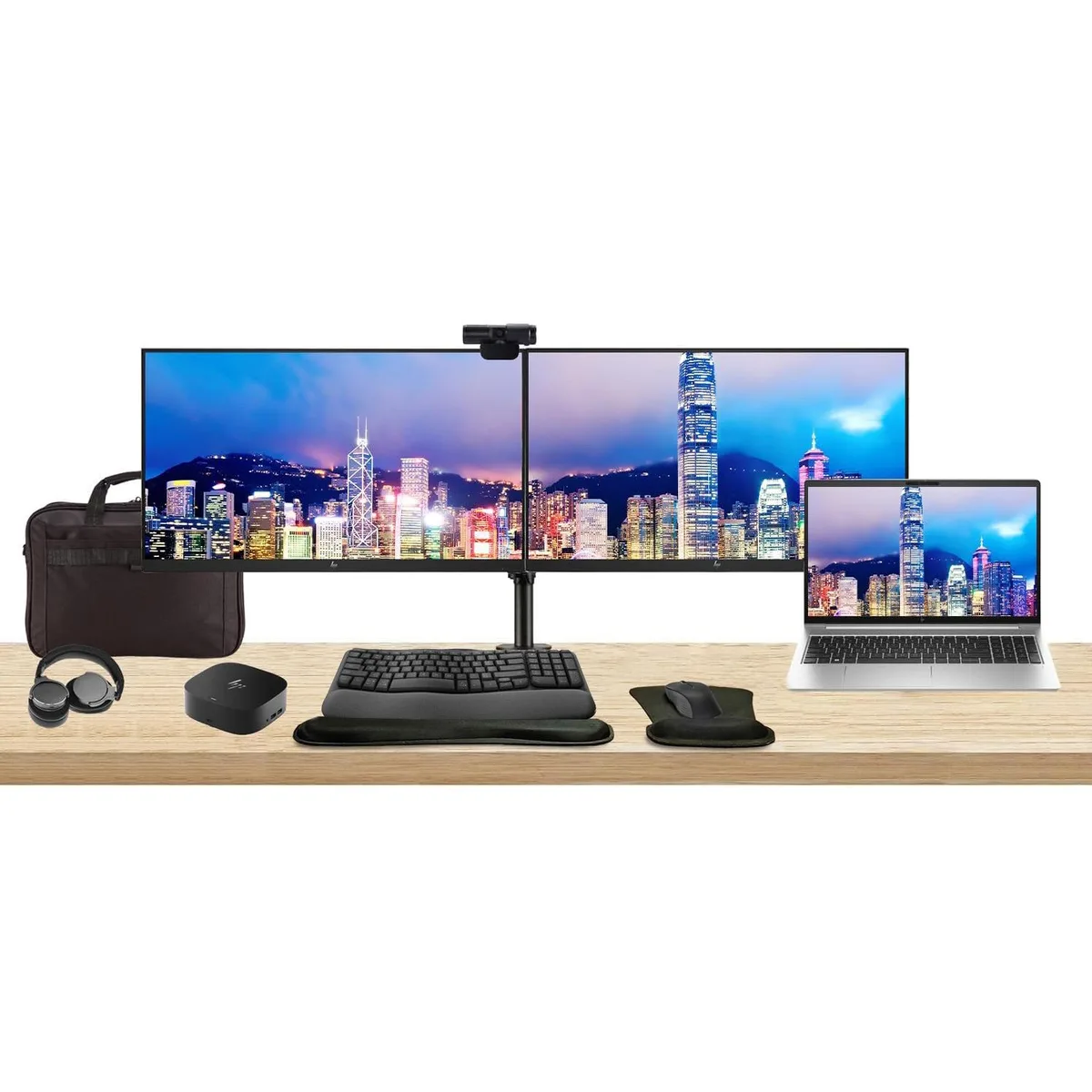 Silver 15.6 inch laptop with two 24 inch monitors on dual stand, dock, keyboard, mouse, webcam, headphones, bag