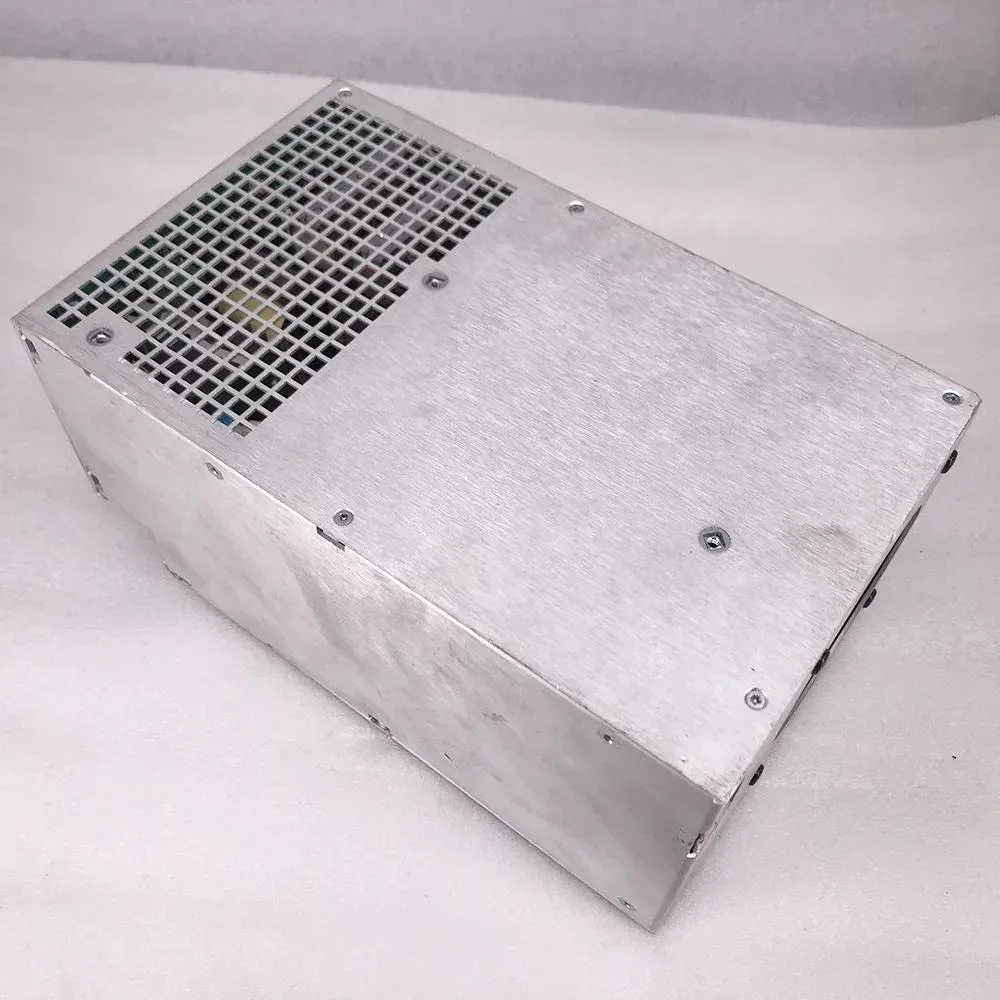Rectangular ATX power supply unit in metal casing with fan grille