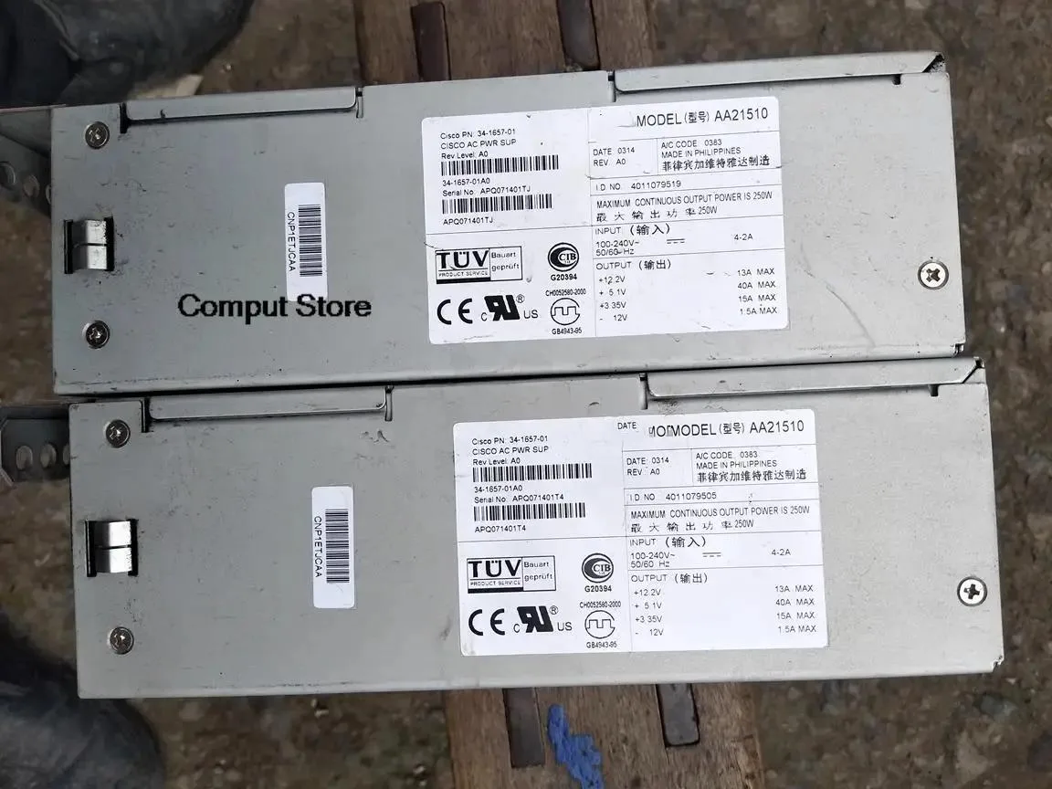 Rectangular metal ATX power supply unit with ventilation grille and label