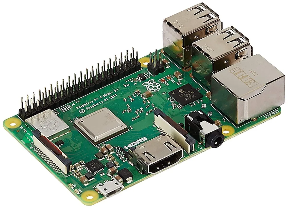Green Raspberry Pi 3 B+ board with GPIO header, four USB ports, HDMI, and microSD slot