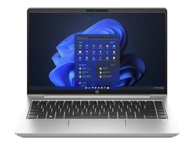 Silver 14 inch laptop with minor scratches and dents
