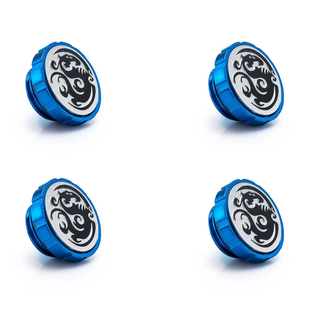 Four royal blue copper stop fittings with magnetic logo tops